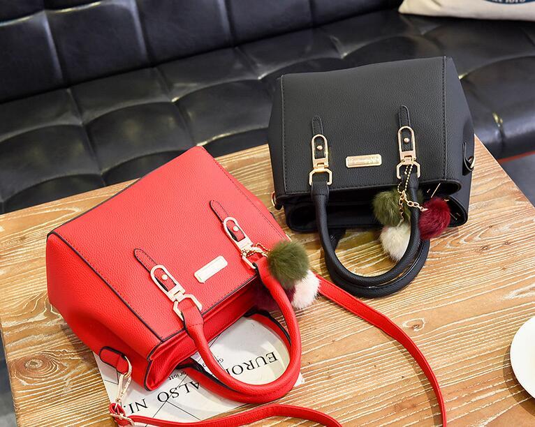 Wendy – Compact Structured Handbag with Fur Pom-Pom Charm