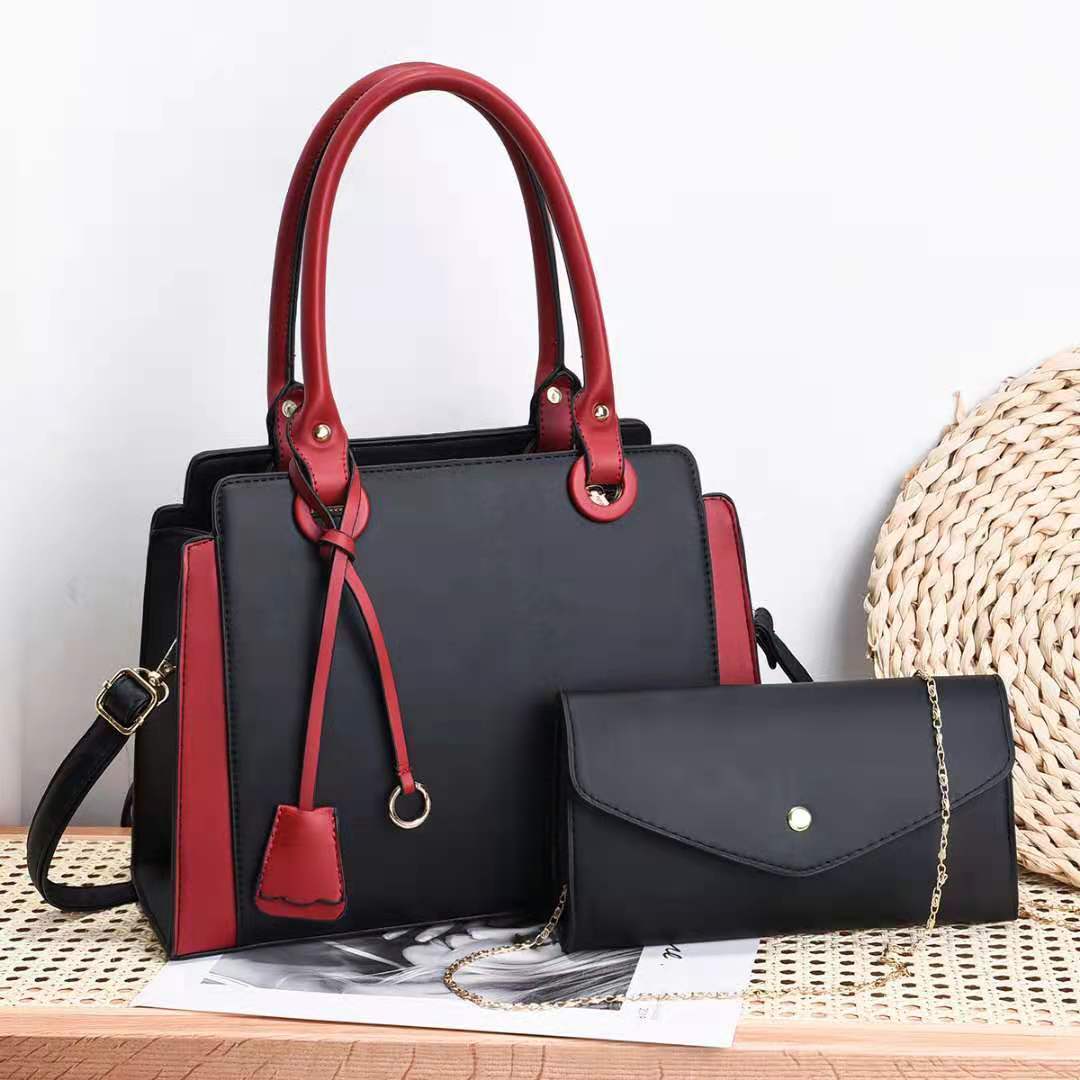 Joanne – Blue Structured Handbag with Matching Clutch and Black Handles