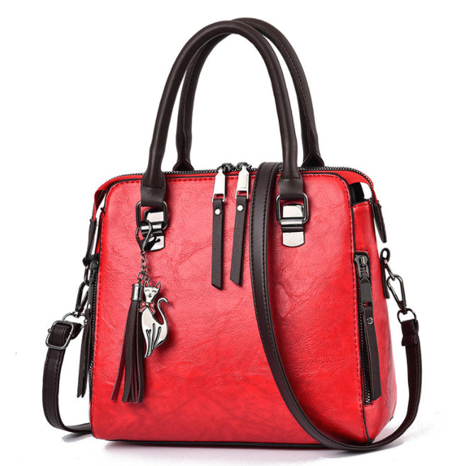 Jessie – Stylish Vegan Leather Handbag with Tassel Keychain