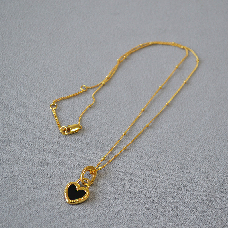 Black and White Heart Pendant Necklace in Gold Color