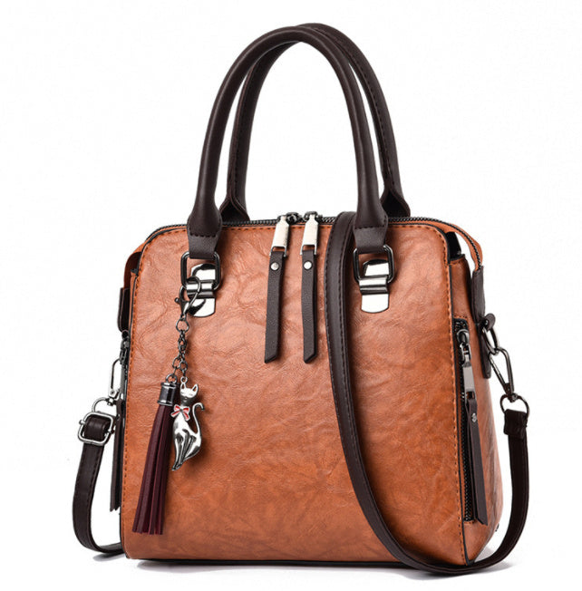 Jessie – Stylish Vegan Leather Handbag with Tassel Keychain