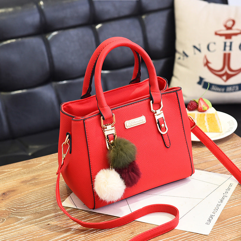 Wendy – Compact Structured Handbag with Fur Pom-Pom Charm