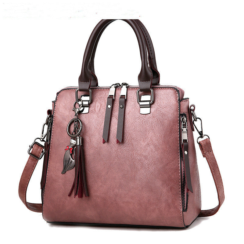 Jessie – Stylish Vegan Leather Handbag with Tassel Keychain