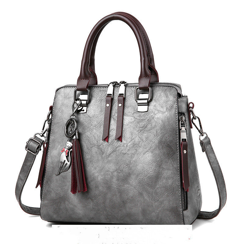 Jessie – Stylish Vegan Leather Handbag with Tassel Keychain