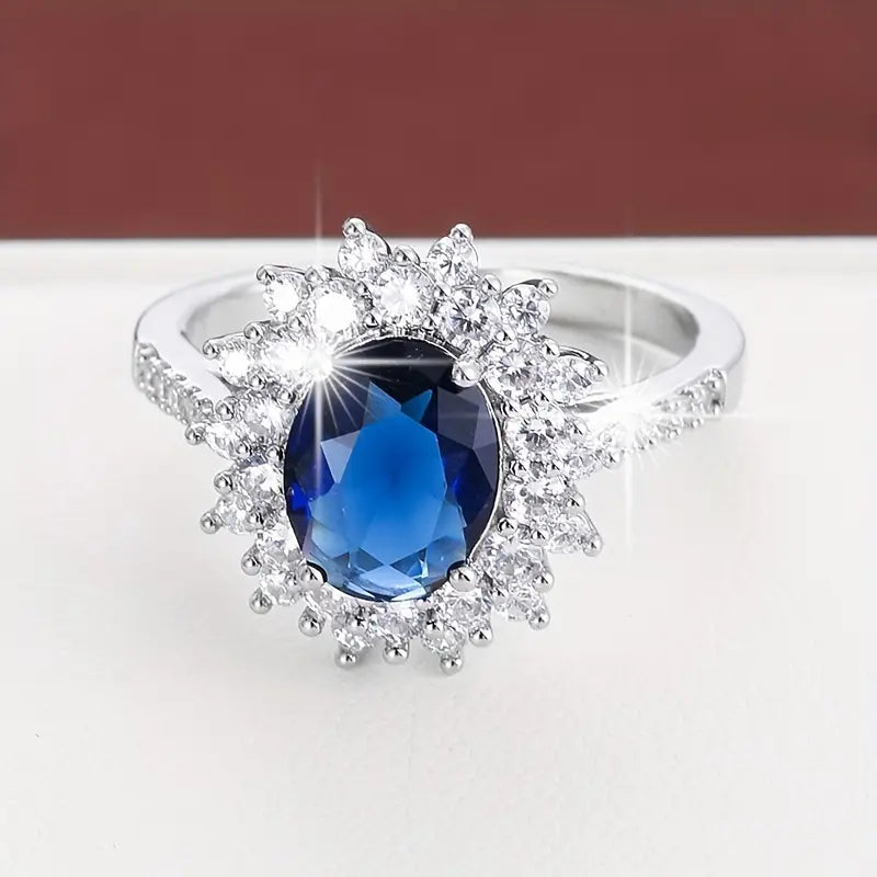 Midnight Sapphire Halo Ring in Gold Color with Crystals