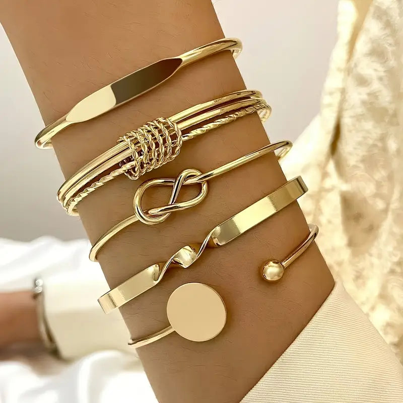 Infinity &amp; Twist Gold Tone Layered Bangle Bracelet Set
