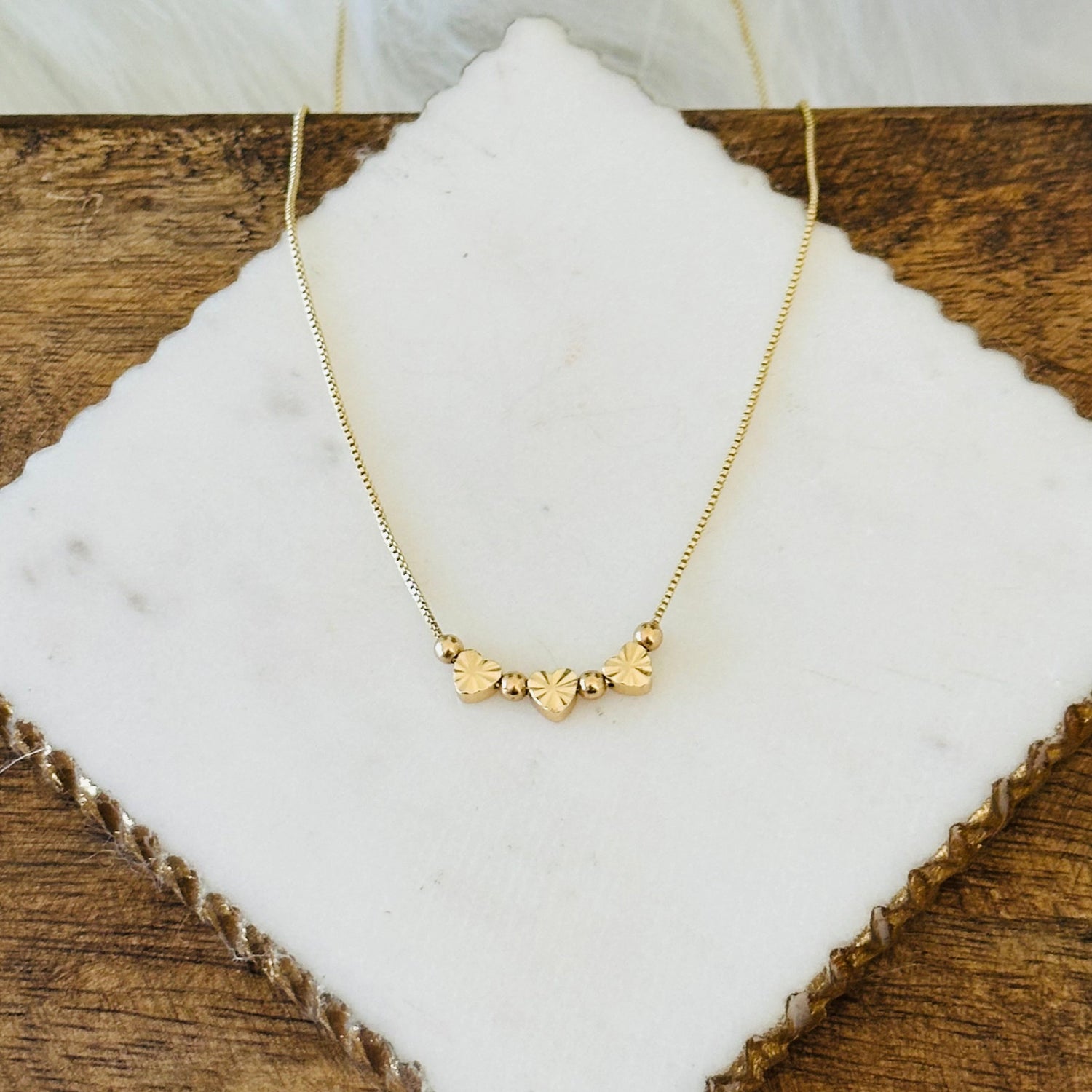 Sunburst Heart Necklace in Gold Tone