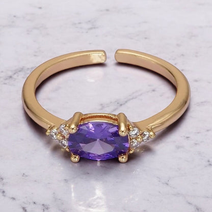 Ruby Solitaire Birthstone Ring in Gold Tone