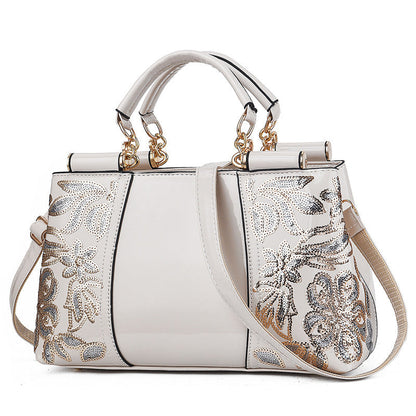 Tara – Compact Structured Handbag with Fur Pom-Pom Charm