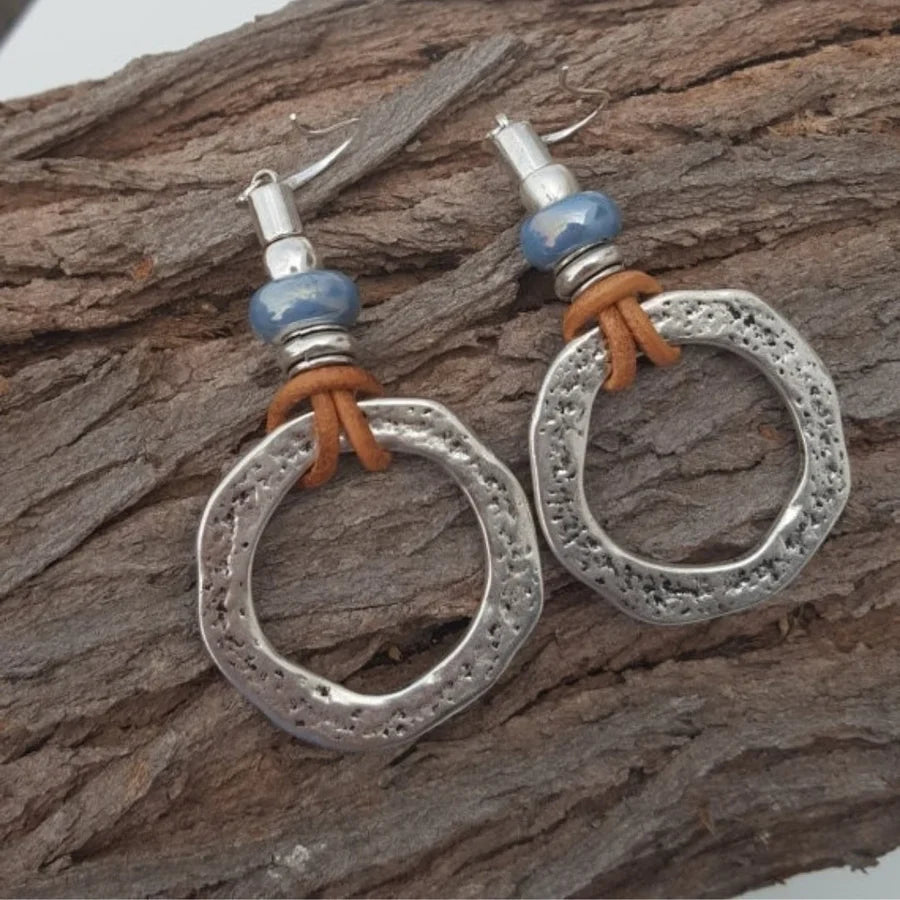 Textured Silver Hoop Earrings with Blue Accent Bead