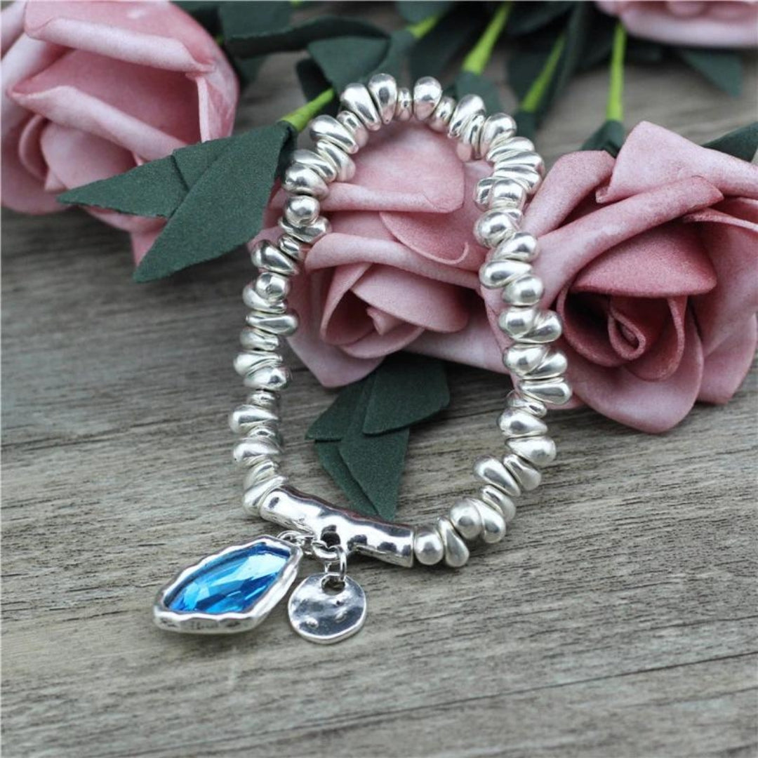 Blue Crystal Charm Bracelet with Silver Beaded Accents