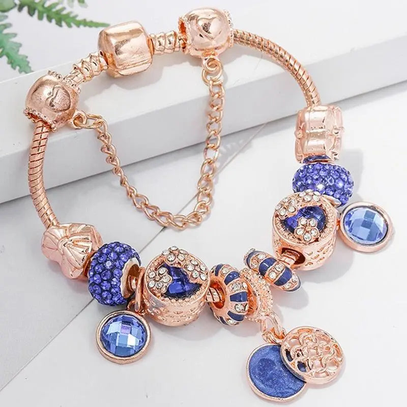 Charm Bracelet in Rose Gold with Blue Crystal Accents