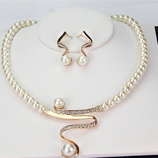 Pearl Necklace and Earrings Set with Gold-Toned Swirl and Crystals