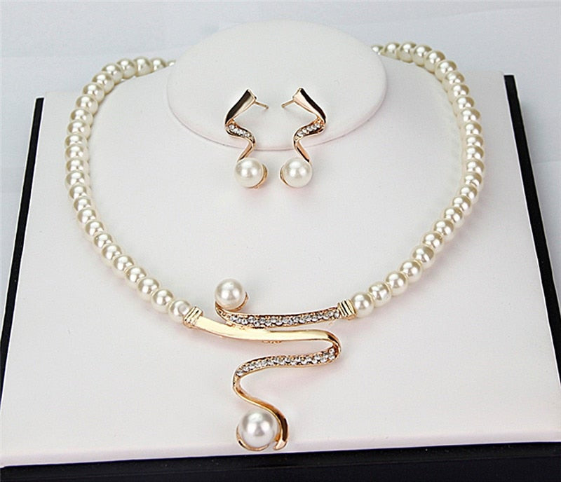 Pearl Necklace and Earrings Set with Gold-Toned Swirl and Crystals