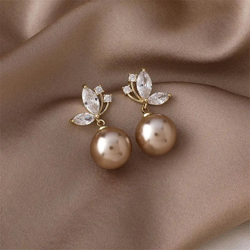 Pearl Drop Earrings with Crystal Leaf Detail in Gold