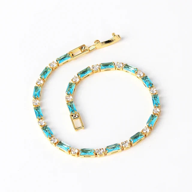 Blue Crystal Tennis Bracelet in Gold with Sparkling Accents
