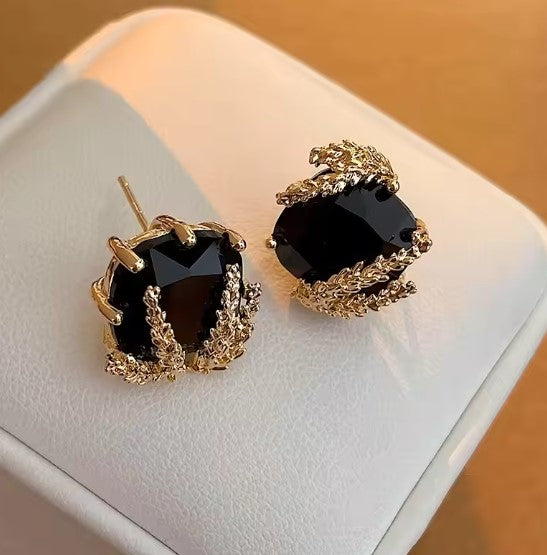 Gold Leaf Stud Earrings with Black Faceted Stone