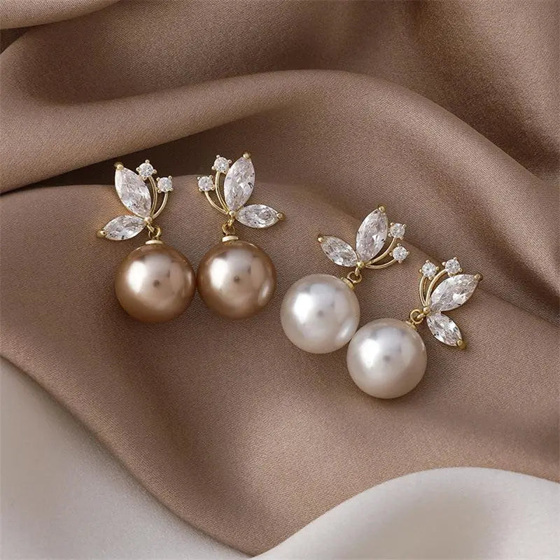 Pearl Drop Earrings with Crystal Leaf Detail in Gold