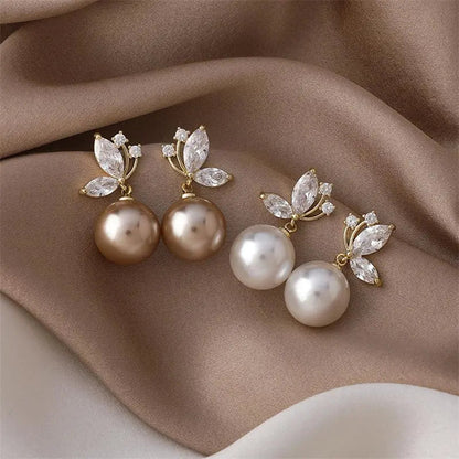 Pearl Drop Earrings with Crystal Leaf Detail in Gold