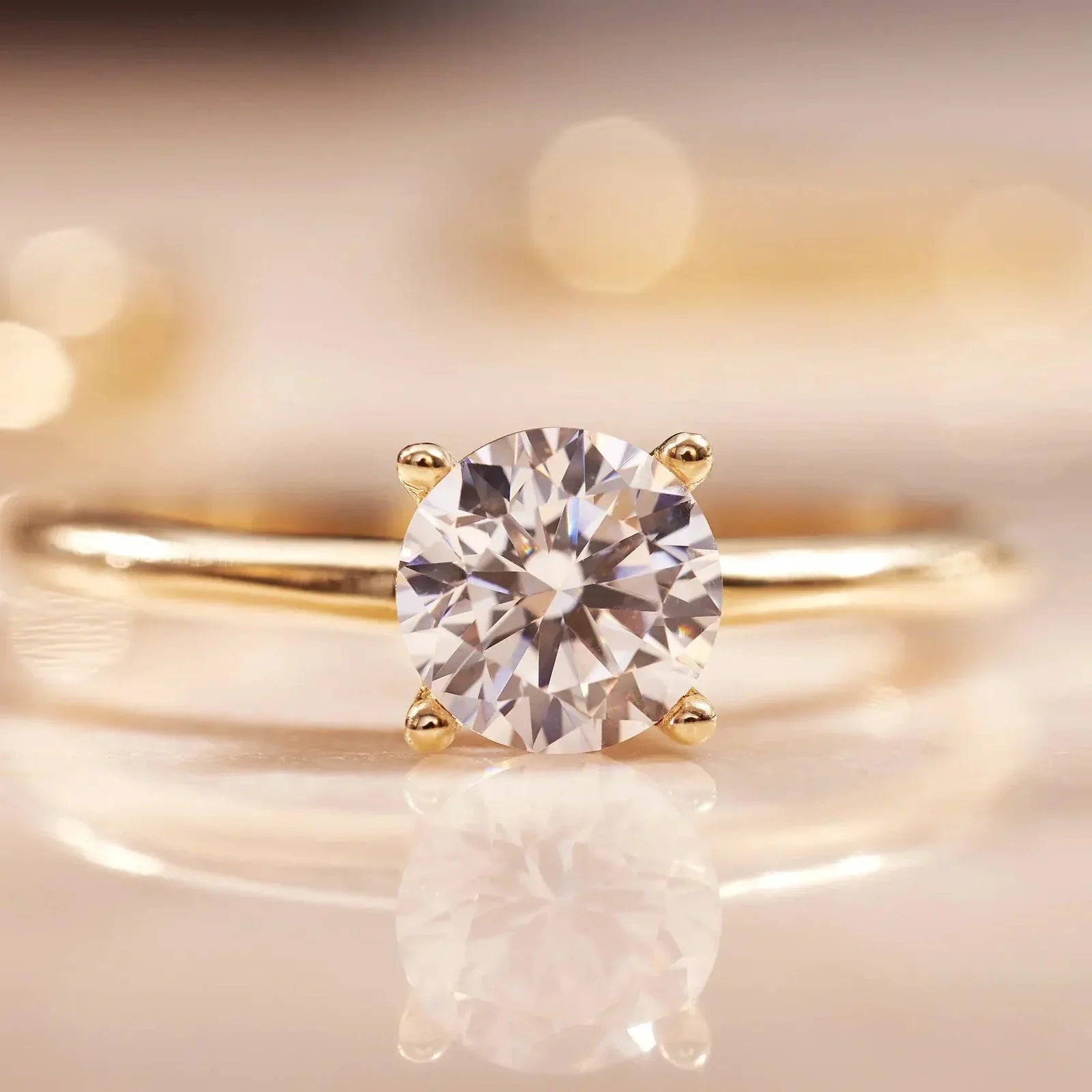 Solitaire Sparkling Round Ring in Gold