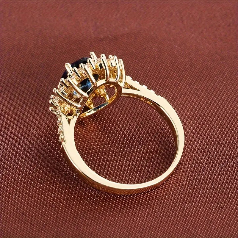 Midnight Sapphire Halo Ring in Gold Color with Crystals