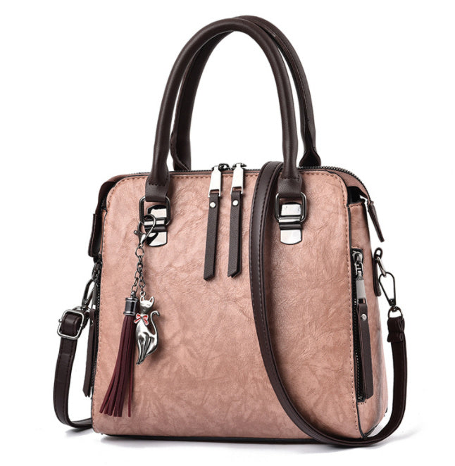 Jessie – Stylish Vegan Leather Handbag with Tassel Keychain