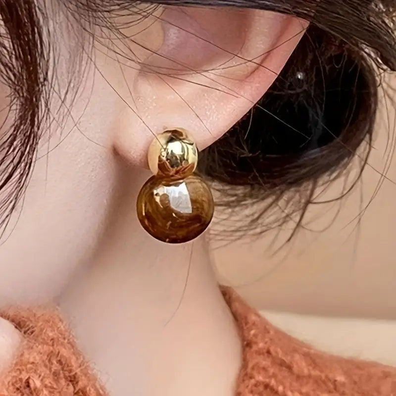 Golden Swirl Drop Earrings in Amber Tone