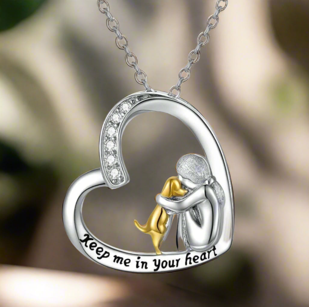 Heart-Shaped Girl and Dog Embrace Necklace with Gold-Tone Detail
