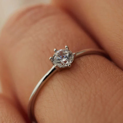 Delicate Solitaire Ring with Sparkling Centerpiece