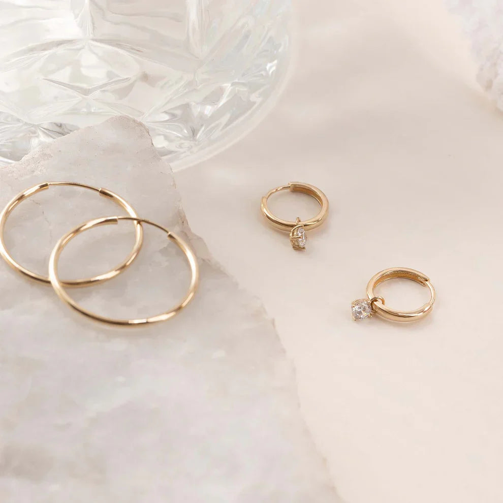 Golden Hoop Earrings with Radiant Crystal Drops