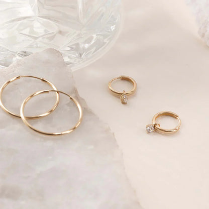 Golden Hoop Earrings with Radiant Crystal Drops