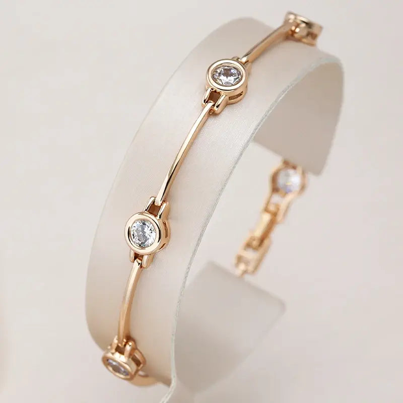 Elegant Gold Bracelet with Shimmering Zirconias
