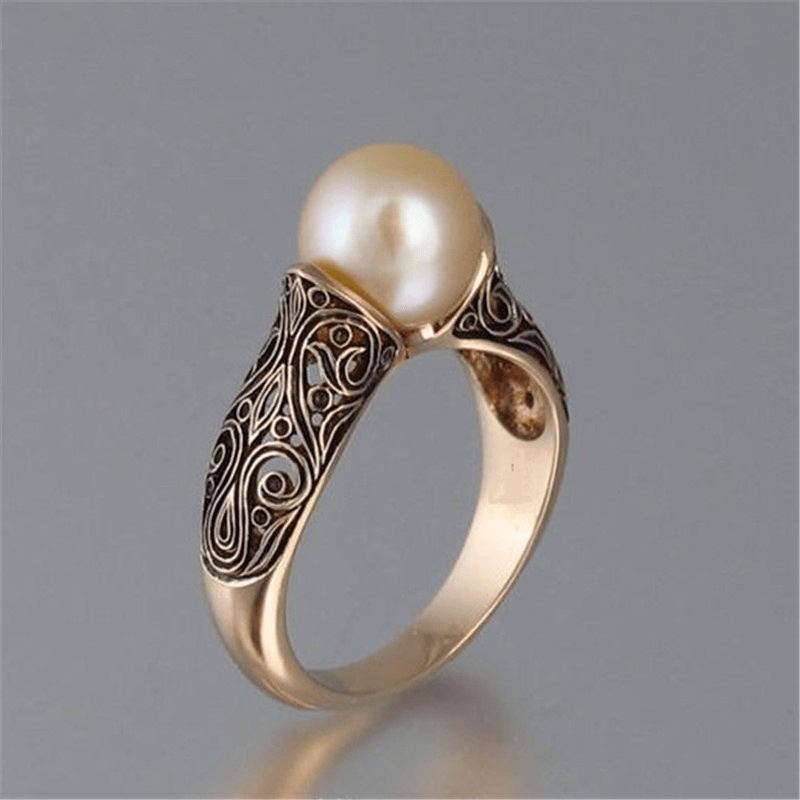 Vintage Gold Ring with Ornate Swirl Detailing and Pearl